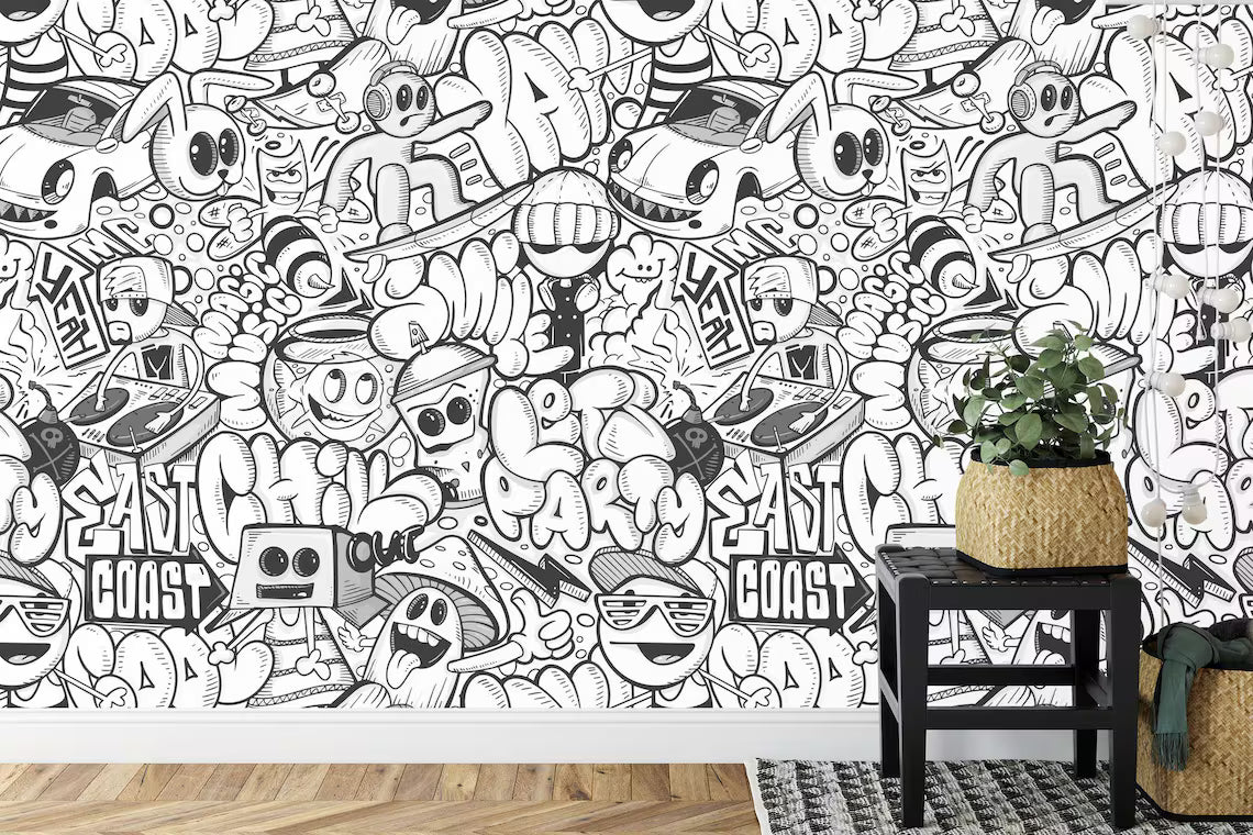 Detail view of black and white doodle mural with whimsical line drawings and abstract elements