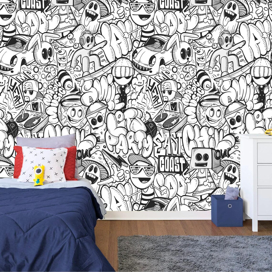 Black and white doodle wall mural installation showing full wall coverage with artistic patterns