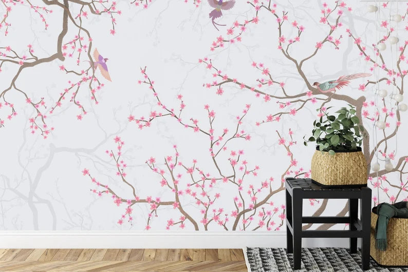 Cherry blossom wall mural installation in modern bedroom with white bedding