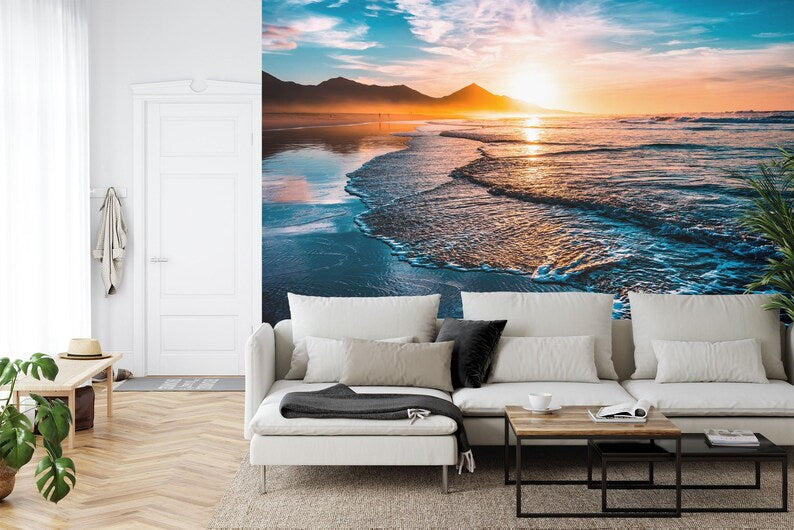 Coastal sunset mural showing golden hour light reflecting on ocean waves
